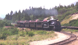 Steam train coming into Bennett