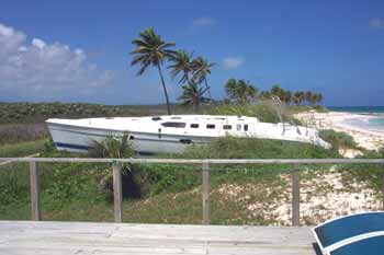 Wrecked sailboat on beach